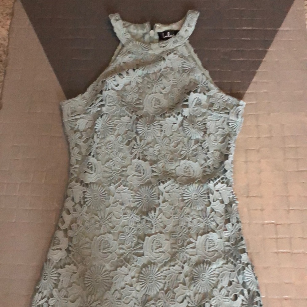 Lulu’s turquoise/green halter style dress.